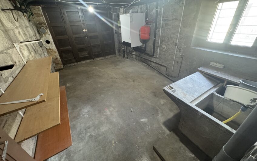 Belle maison T6/7 de 112.32 m² avec 2 garages et jardin