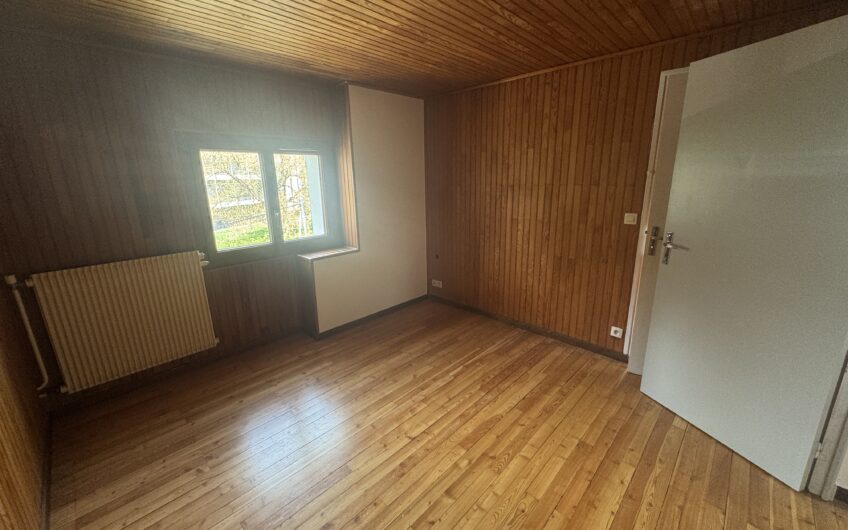 Belle maison T6/7 de 112.32 m² avec 2 garages et jardin